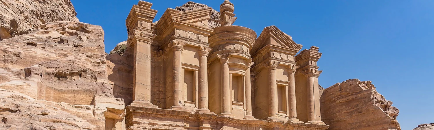 Ancient carved stone architecture of Al-Khazneh, the Treasury, in Petra, Jordan
